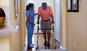 home-health-aide-home-care-for-medicare-patient-walking - Mind and mobility